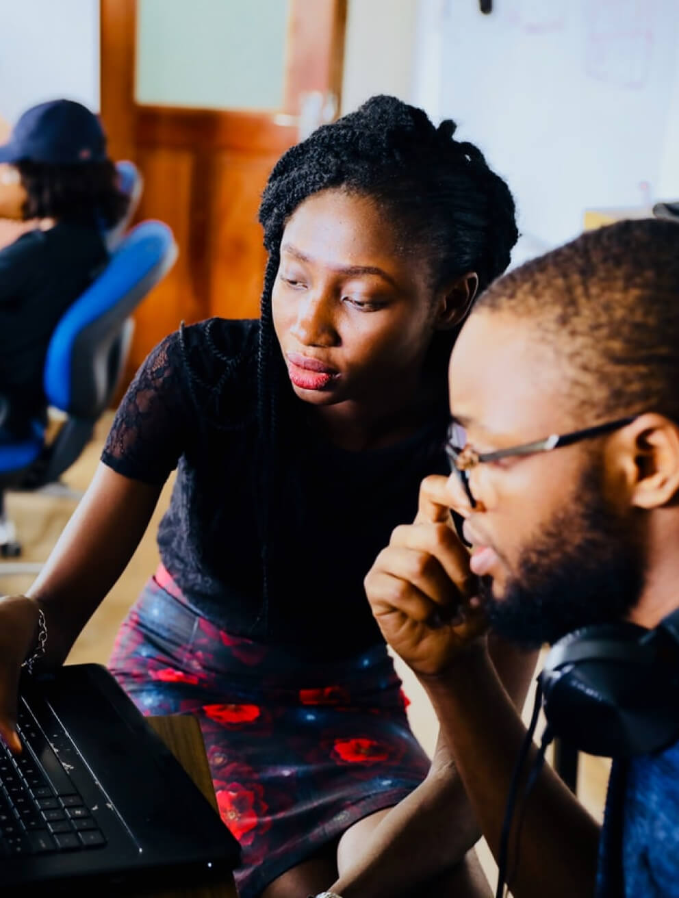 two students looking at a computer