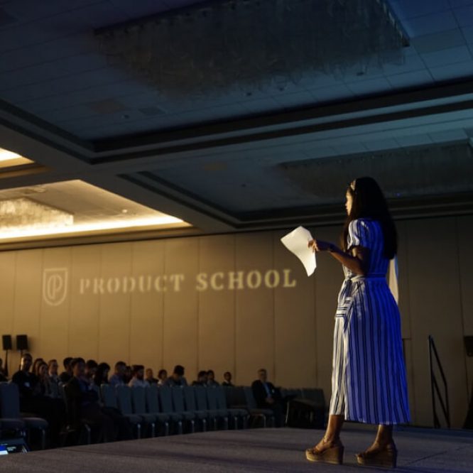 student speaking on stage